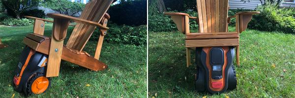 Mo, the robotic lawnmower, stuck under an Adirondack chair